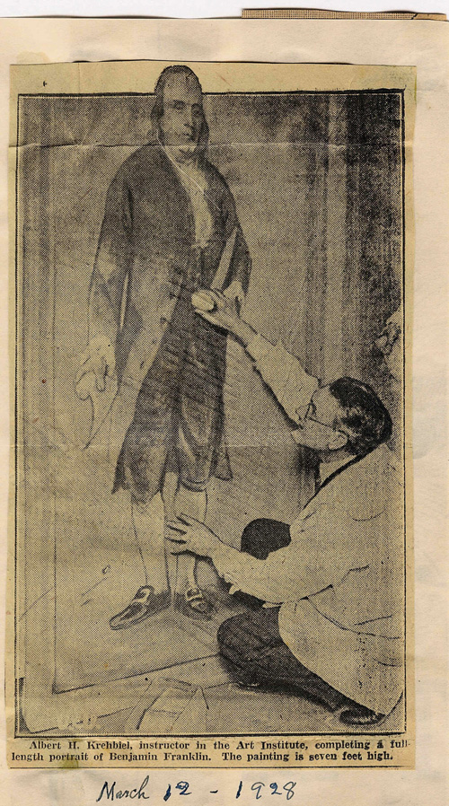 Newspaper photograph of Krehbiel hanging his portrait of Ben Franklin